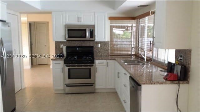 8430 NW 25th Ct – photo 4