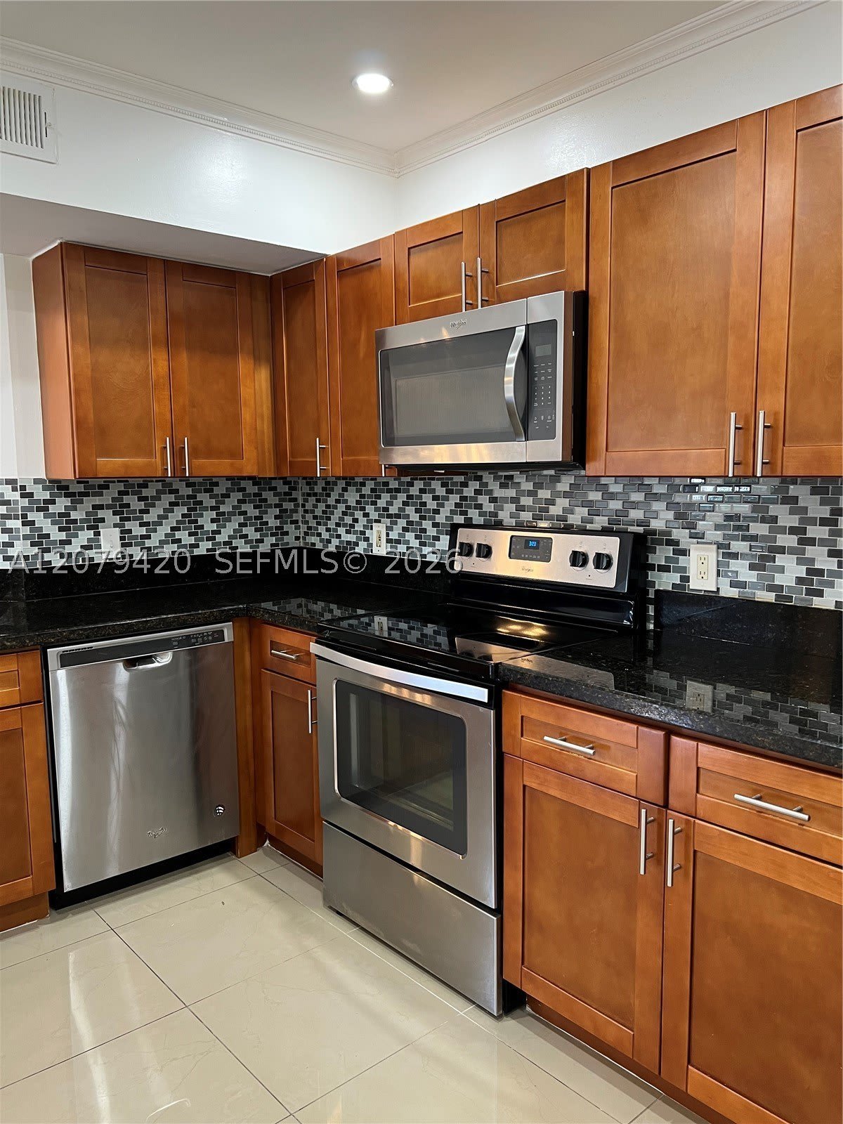 8721 Wiles Rd – photo 4