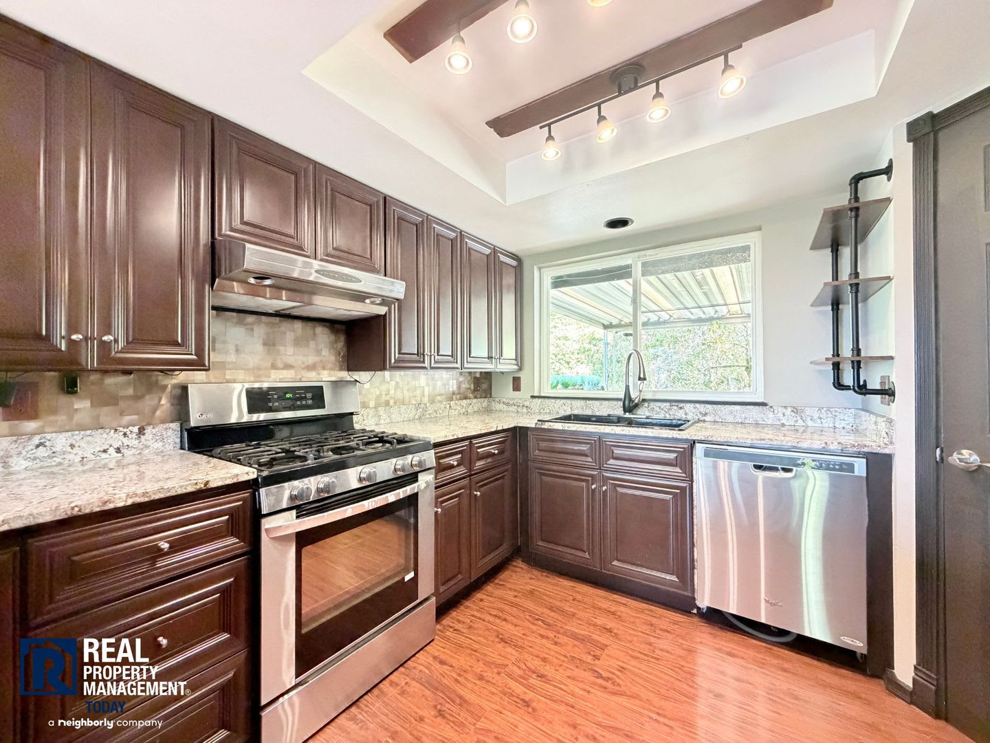 Rare 4-Bedroom Puyallup Home with Full Lower-Level Suite, Updated Kitchen & Balcony! – photo 4