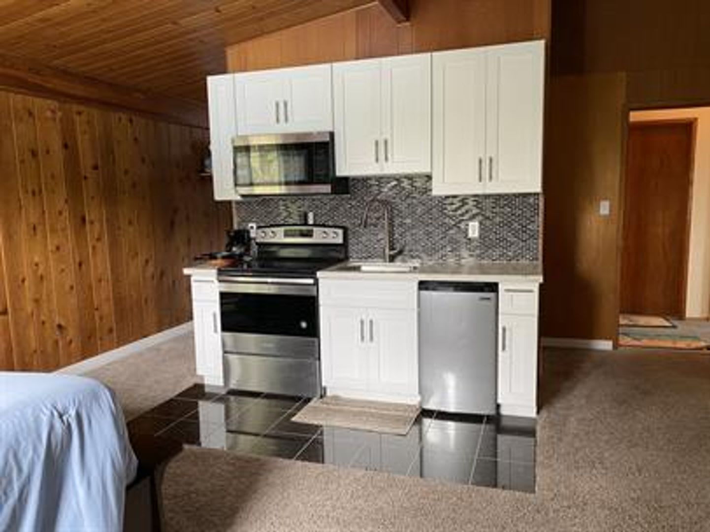 Small Studio Condo, Partially Furnished, Located in Town! – photo 1