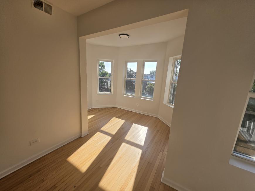 7831 South Colfax Ave. – photo 2