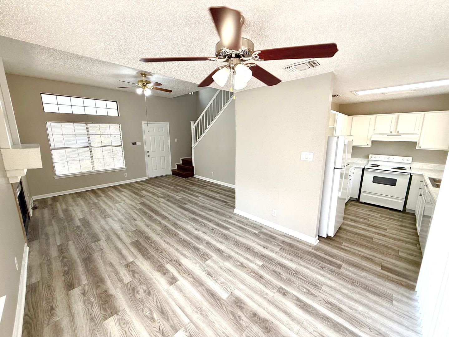 REMODELED Two Story Home With Cozy Fireplace + 2-Car Garage + Large Fenced Backyard! – photo 5
