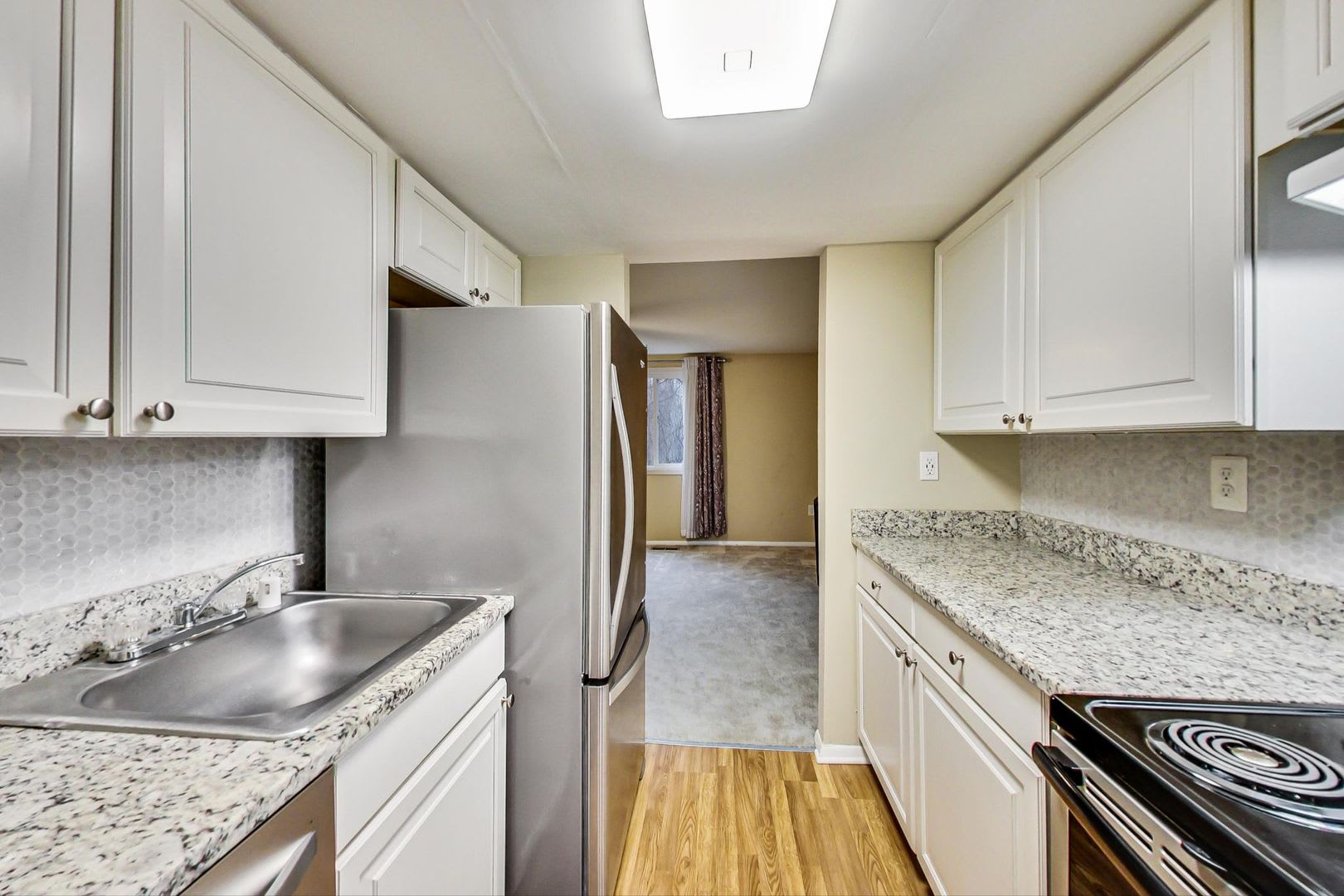 Updated 3+2.5 End Unit w/ 2 PARKING SPACES – photo 2