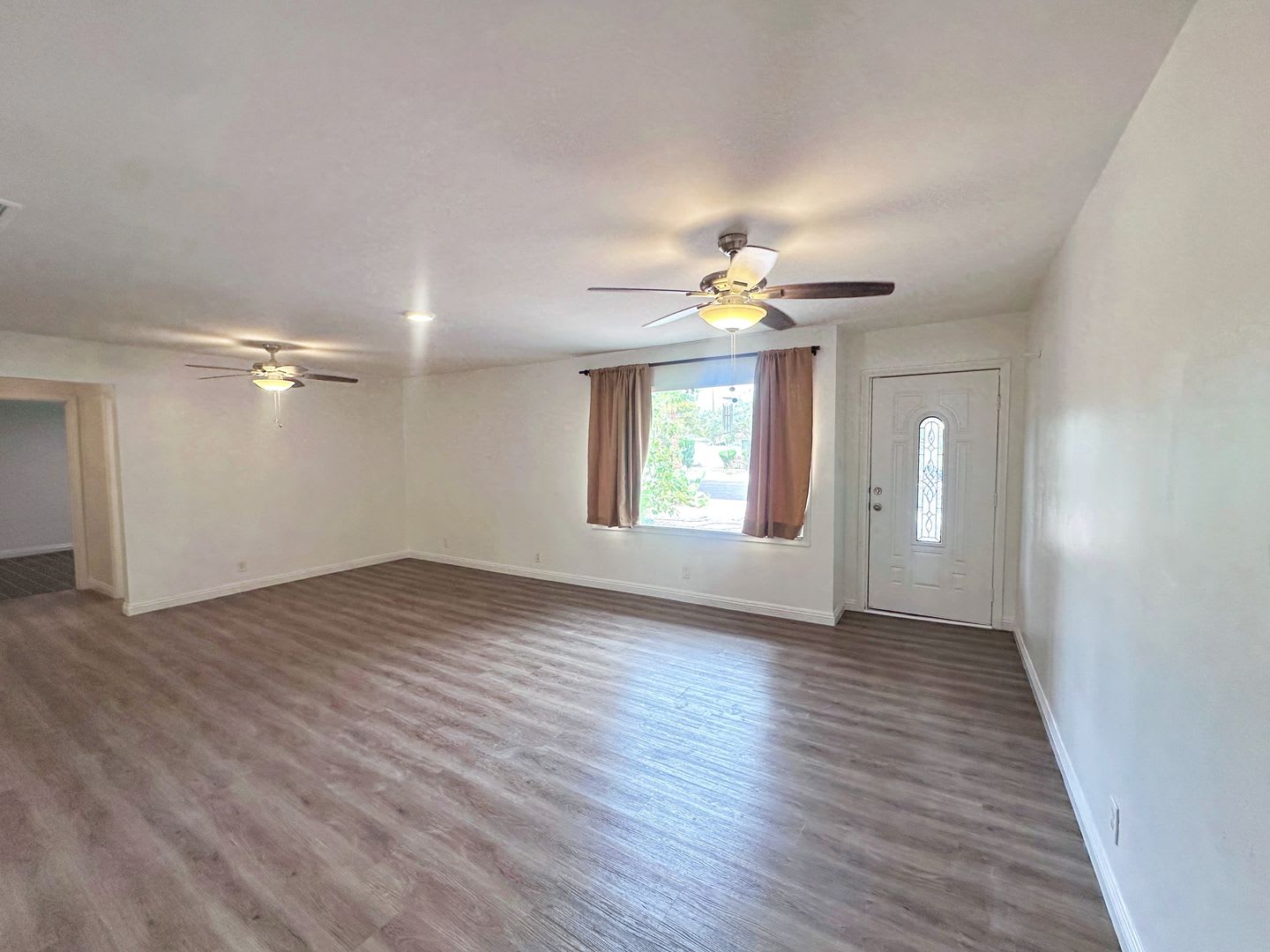 Remodeled 3-Bedroom Home Near Downtown—Covered Parking, Landscaping & Pest Control Included – photo 4