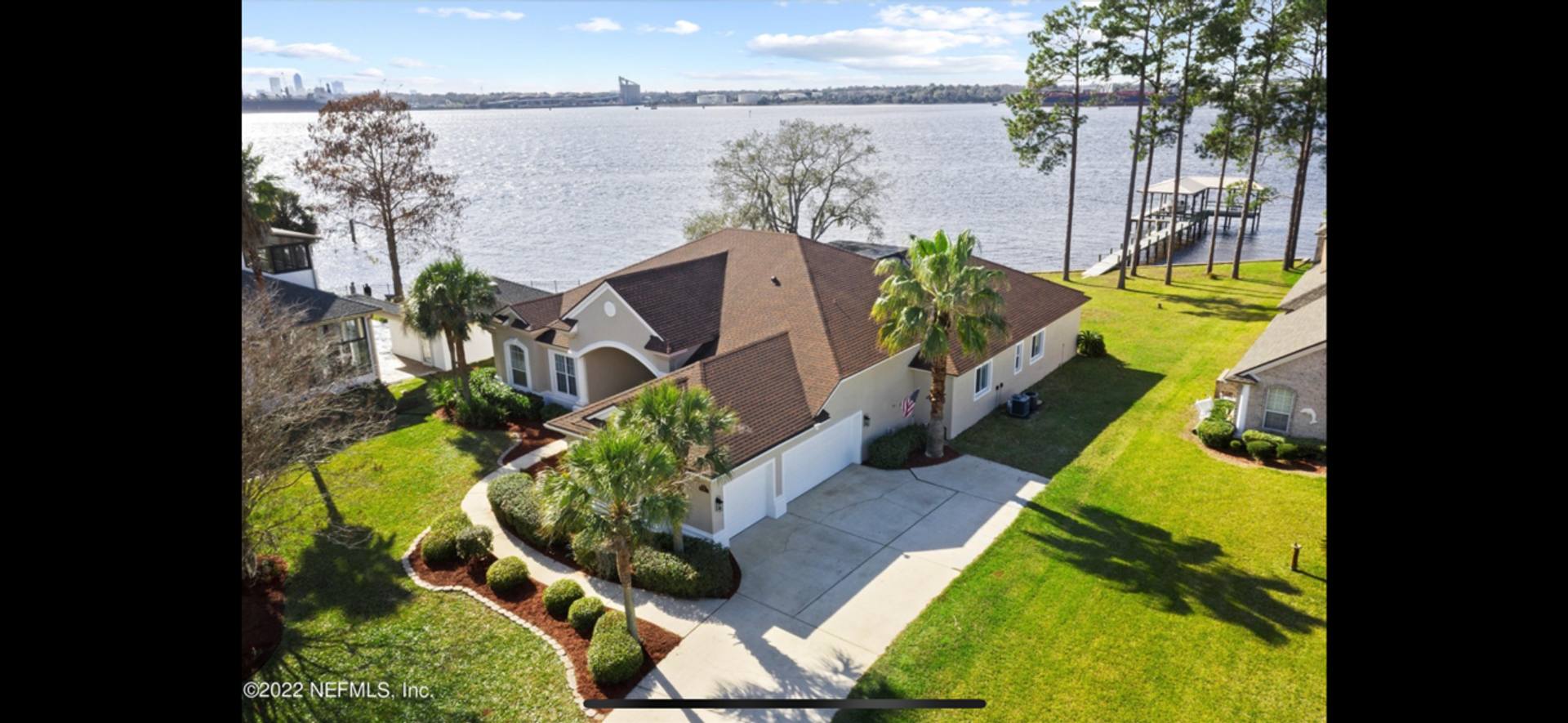 Live Like You're on Vacation Every Day! Stunning Riverfront Home with Unforgettable Sunsets! – photo 2