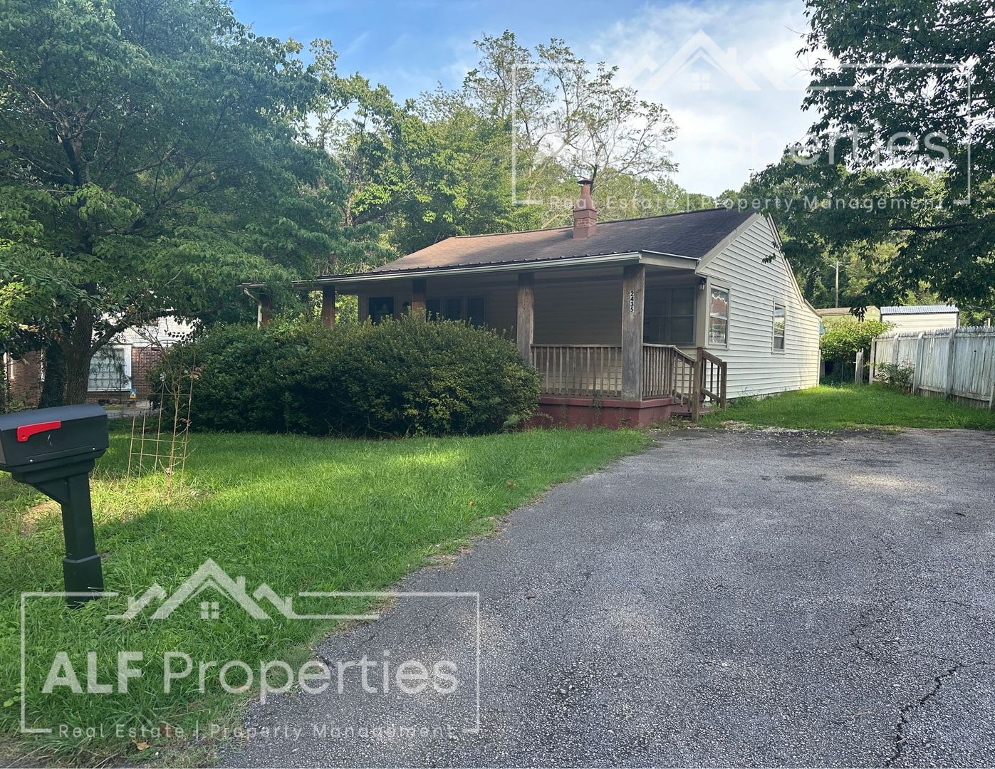 Charming 2-Bedroom Home with Bonus Sunroom, Covered Patio & Fenced Backyard – photo 1