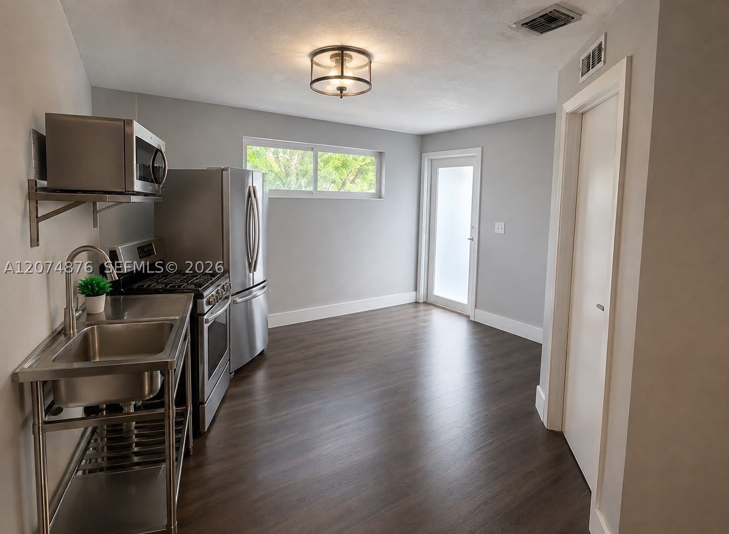586 NW 48th St – photo 3