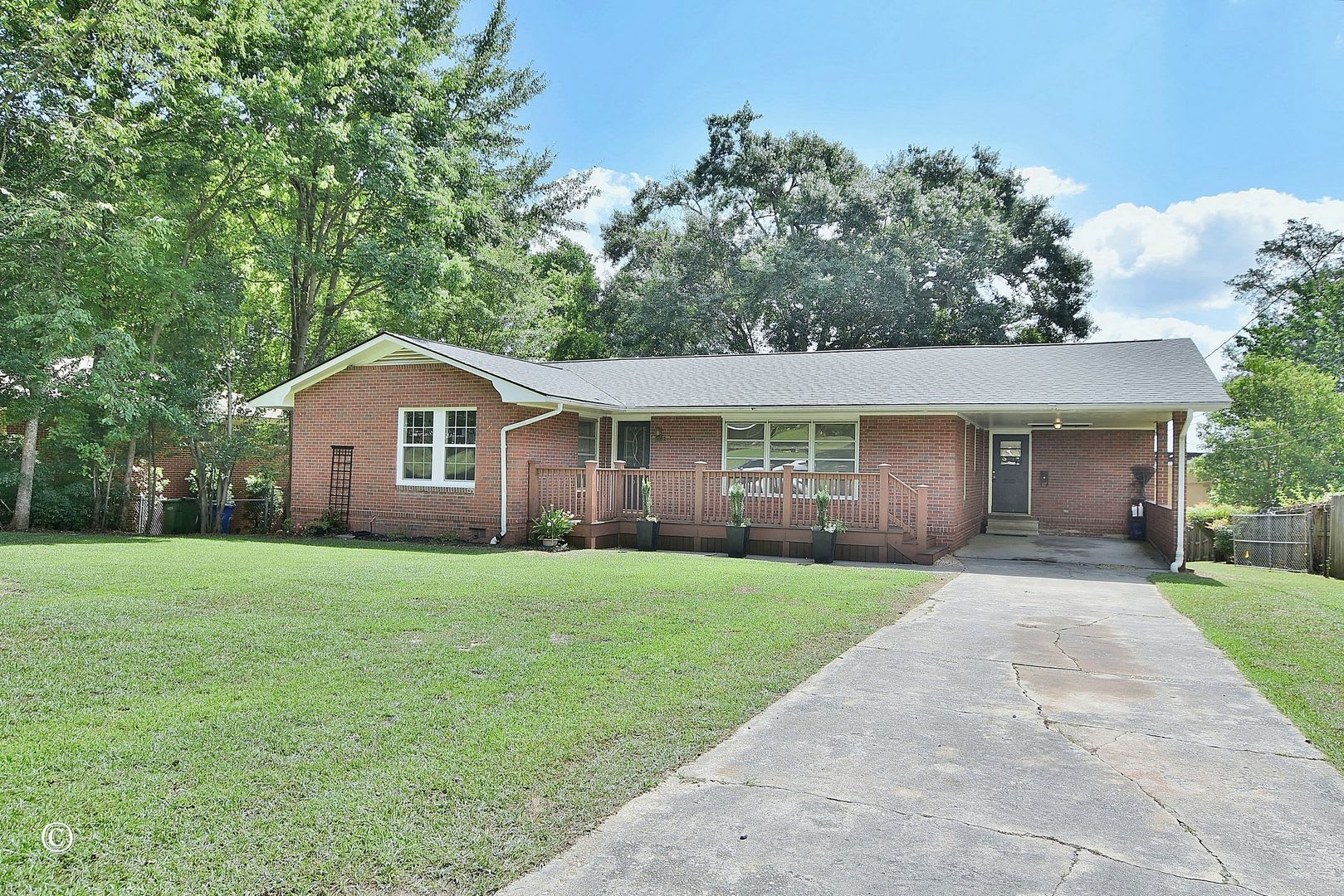 3 Bedrooms 2 Baths 1 Carport – photo 2