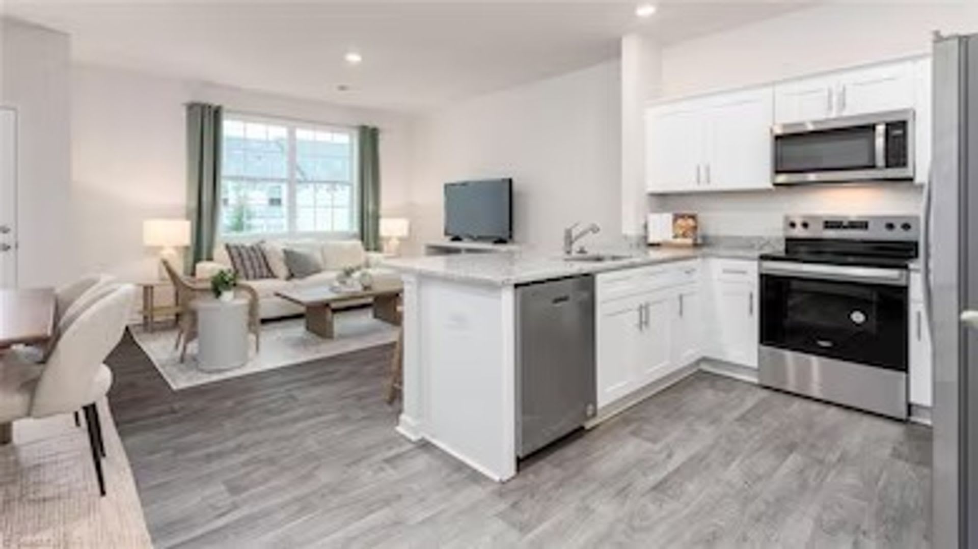 Modern 3-Bedroom Townhome with Garage in North Village Townes – photo 4