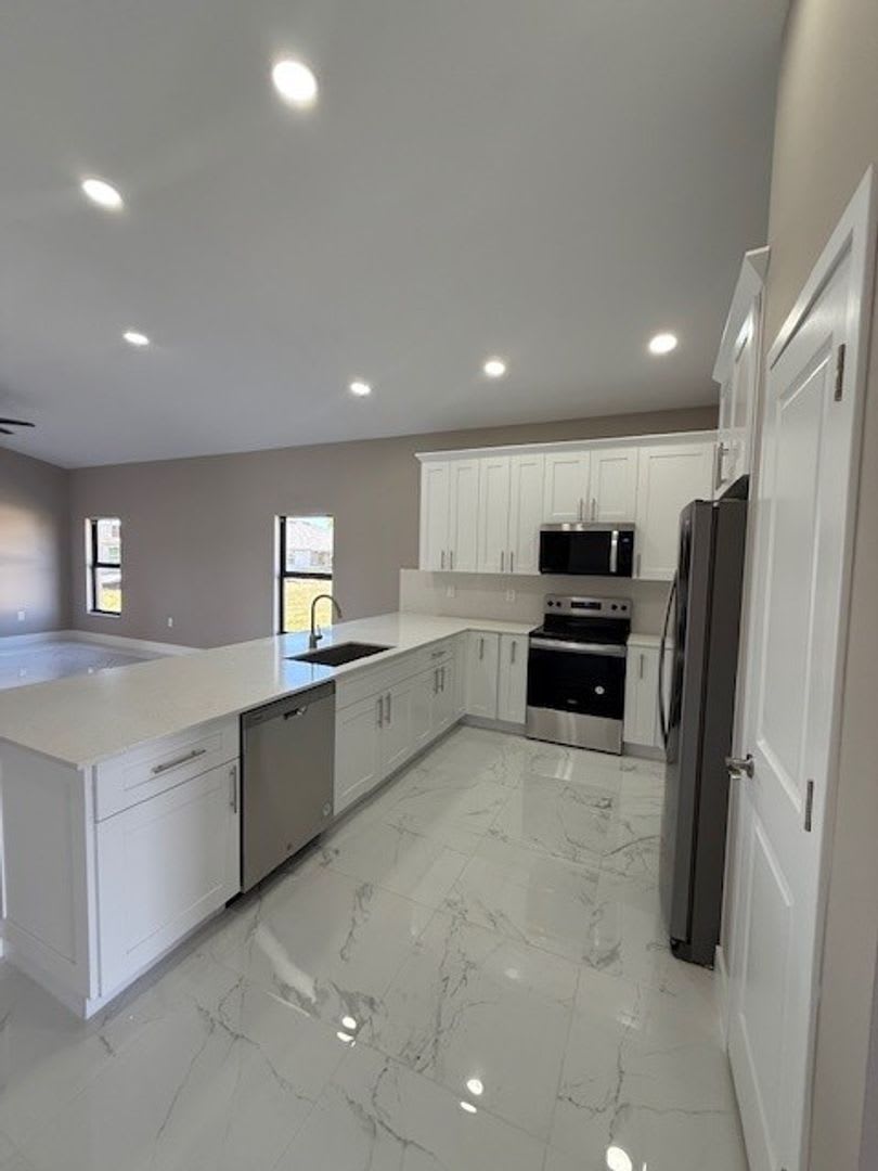 Brand-New Luxury Home with 3-Car Garage & Lawn Care Included – photo 5