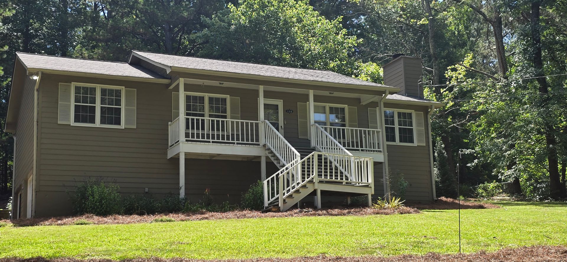 Drive under Ranch on Wooded Corner lot lots of room for a shop or 3rd small car – photo 4