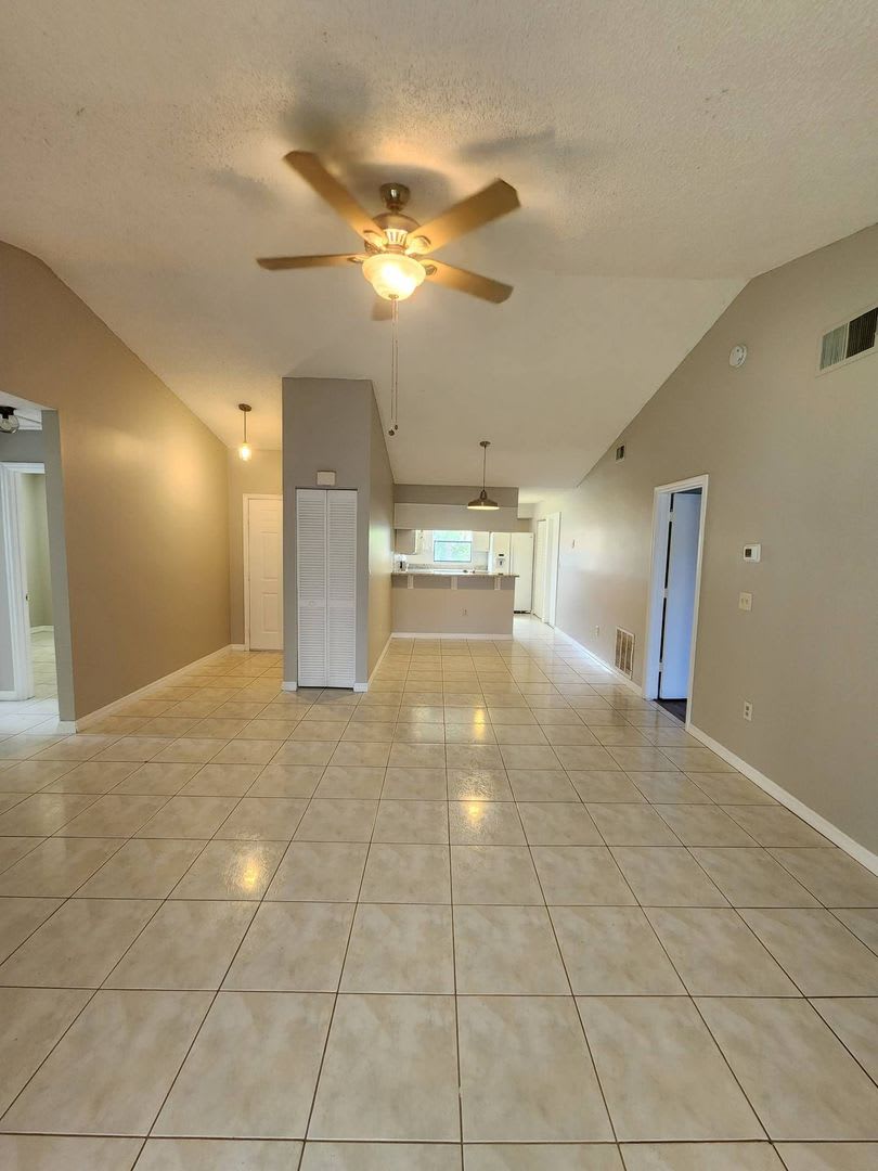 Move-In Ready Poinciana Gem with a Brand-New Kitchen & Screened Porch! – photo 4