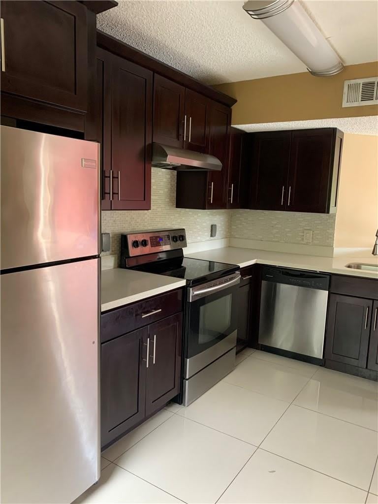 8891 Wiles Road – photo 2
