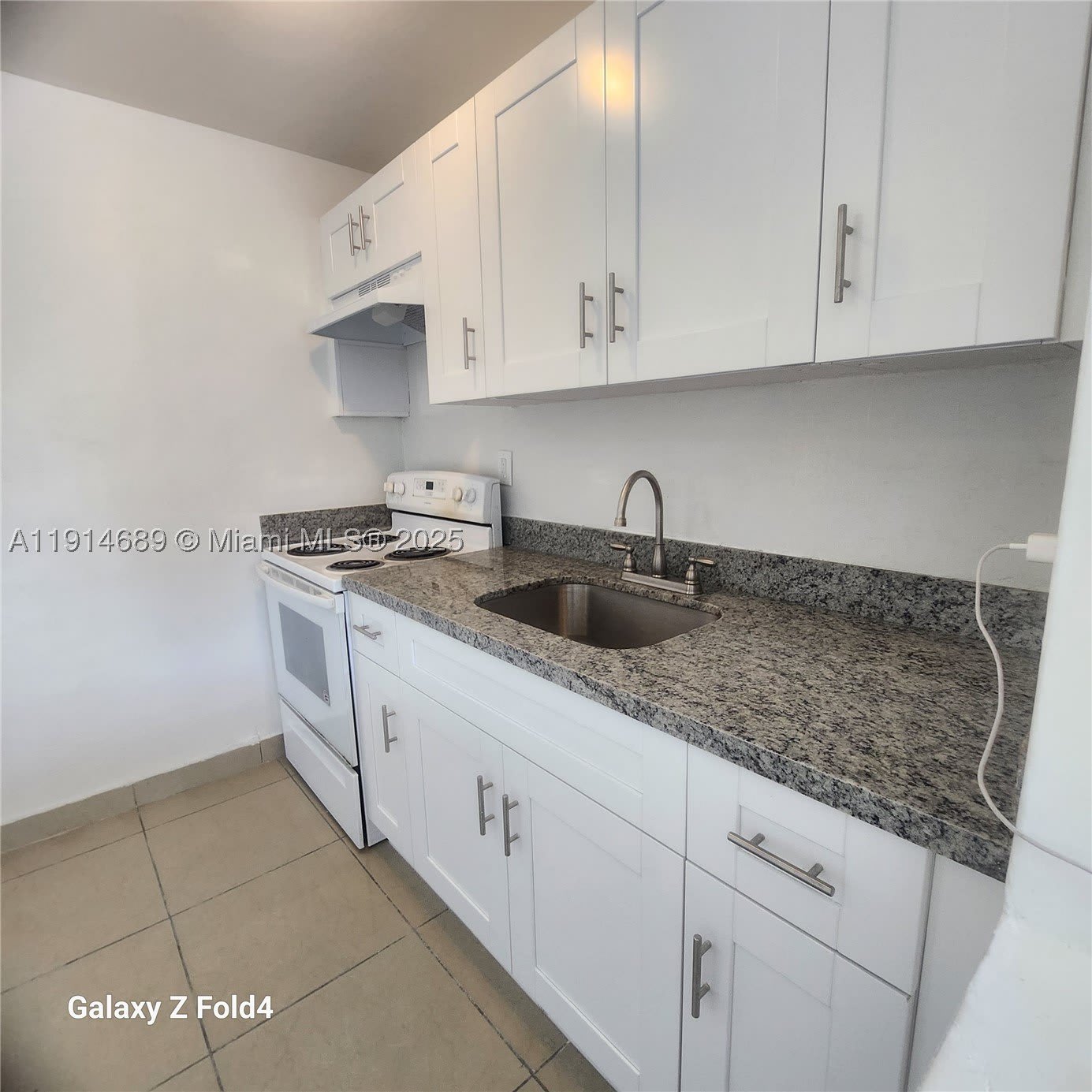 2400 Nw 10Th Ave – photo 1