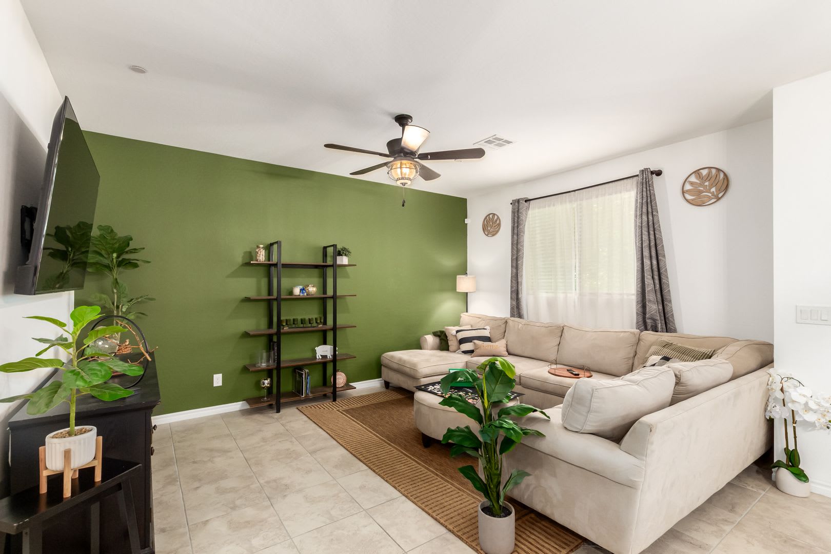 Beautiful corner lot townhome with custom paint, plentiful community green spaces. – photo 4