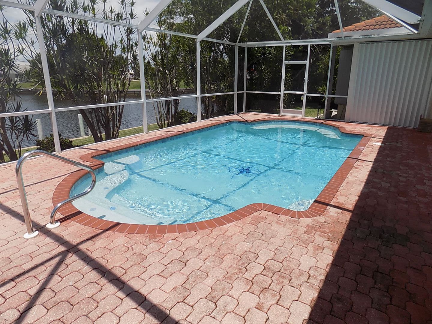 Short Term Rental ** Available 6/1/26 ** 3 Bed/2 Bath Pool Home ** Punta Gorda Isles** $7,500/mo – photo 1