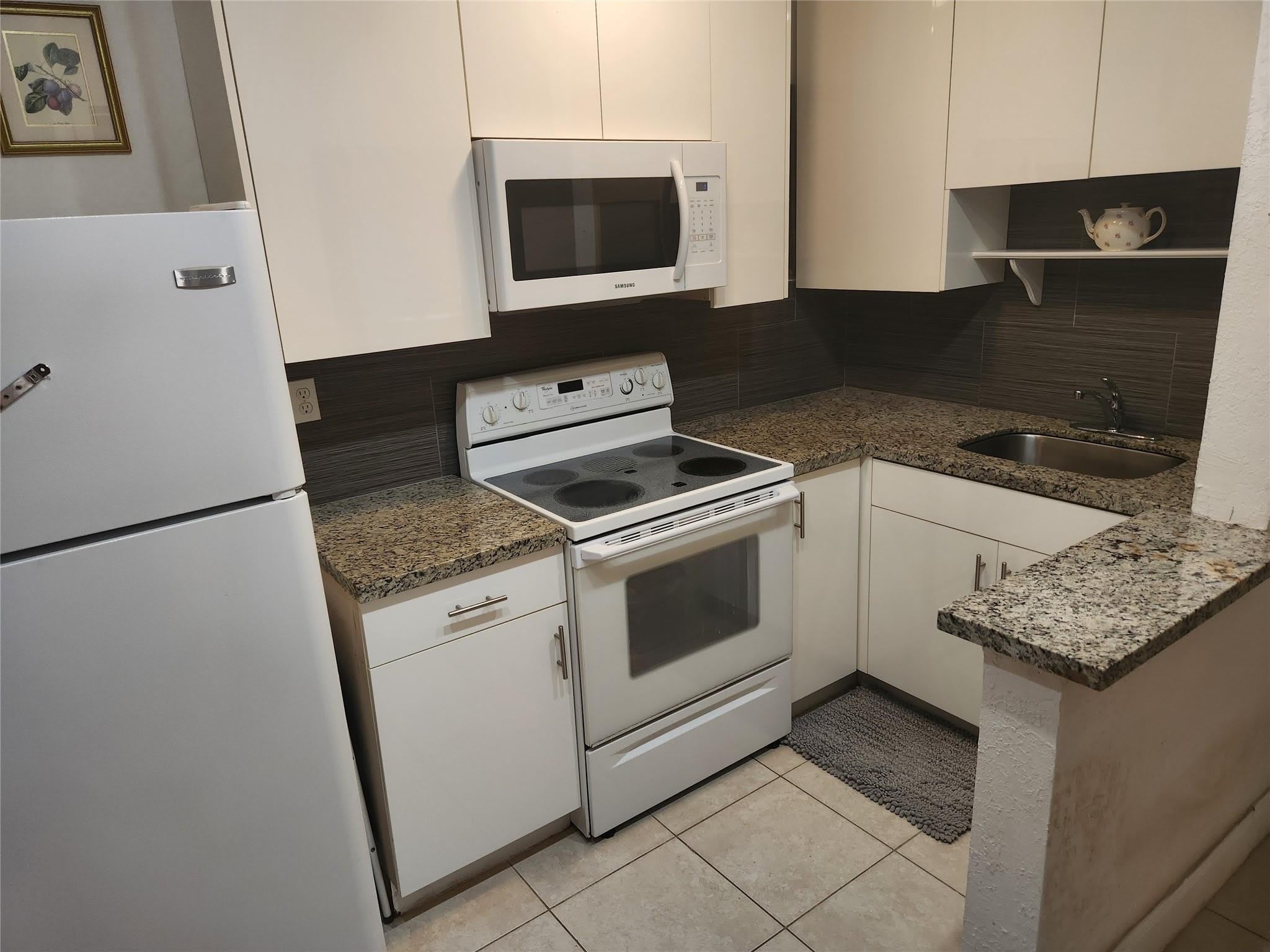 1597 NE 53rd Court – photo 2