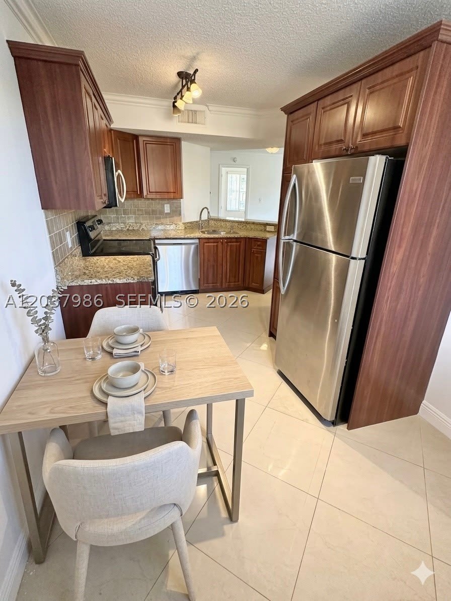8955 Wiles Rd – photo 5