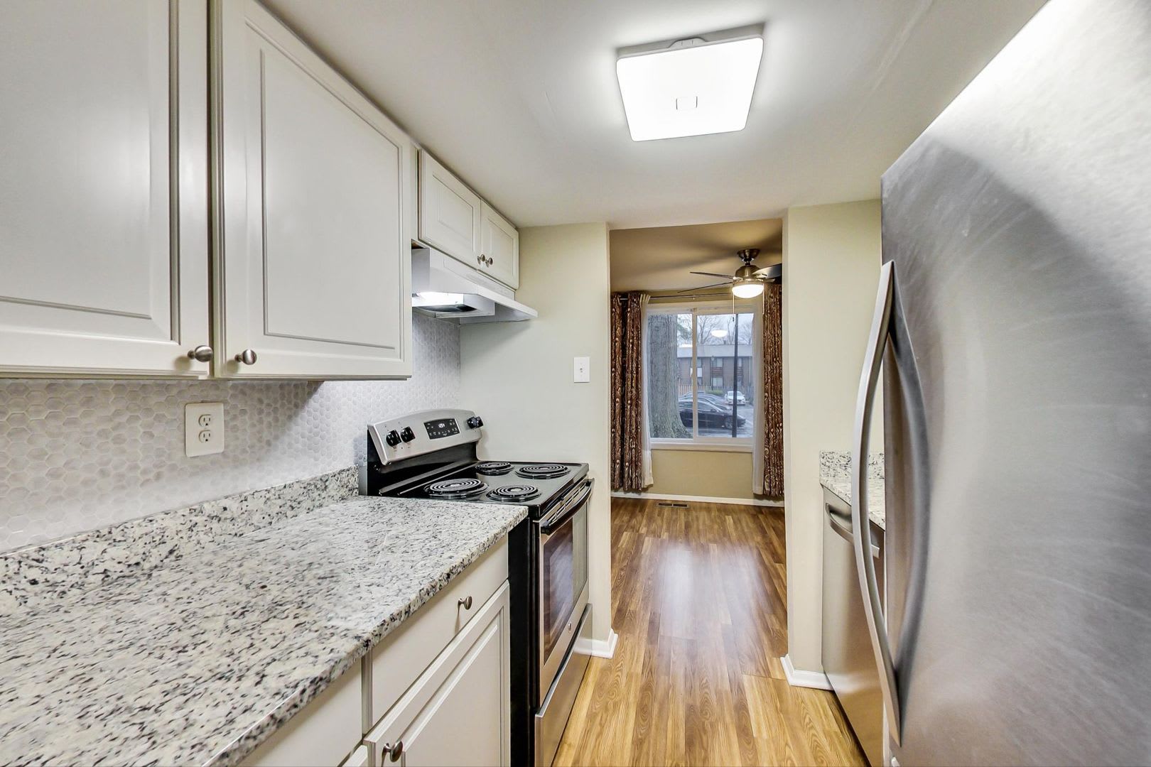 Updated 3+2.5 End Unit w/ 2 PARKING SPACES – photo 3