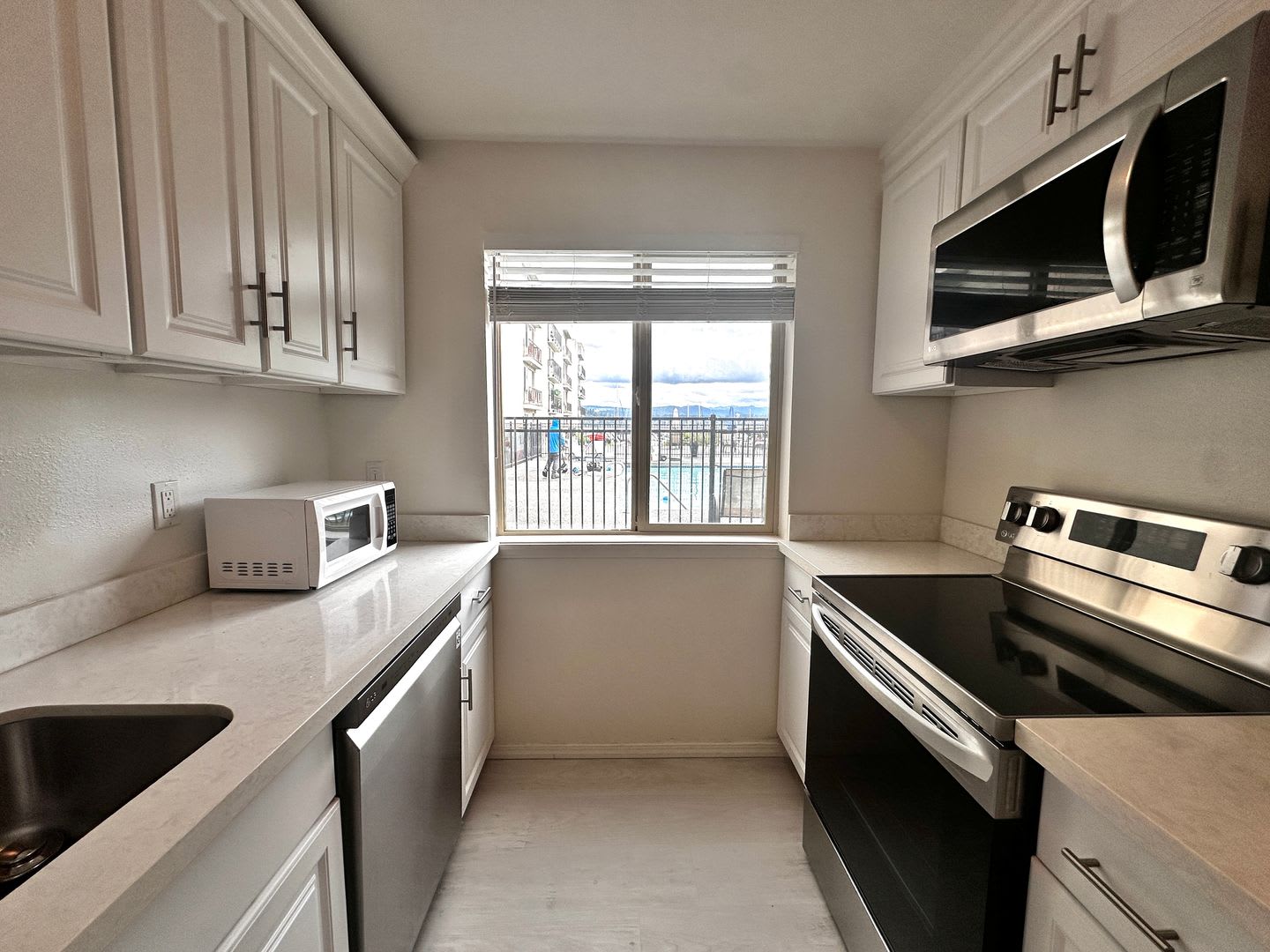 Updated 2-Bedroom Condo with Water Views, 2 Parking Spaces & Poolside Location – photo 5