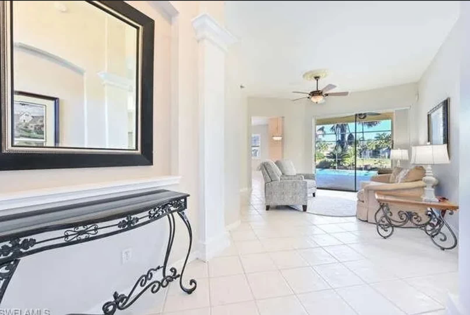 Lakefront 3 Bed + Den 2 bath home with pool and spa tub in Waterways of Naples Community – photo 3