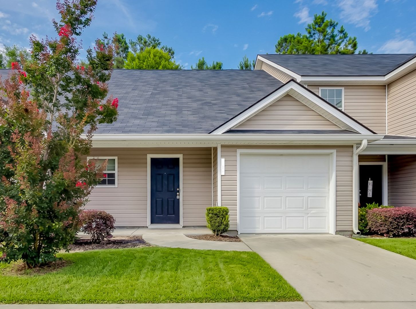 Spacious 3BR Townhome with Main-Level Primary Suite – photo 1