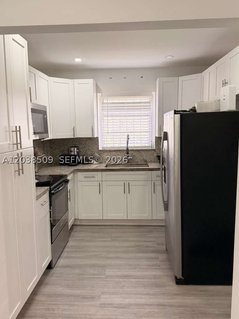 2920 SW 15th St – photo 4