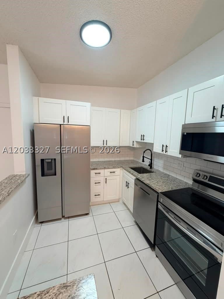 9499 W Mcnab Rd – photo 3