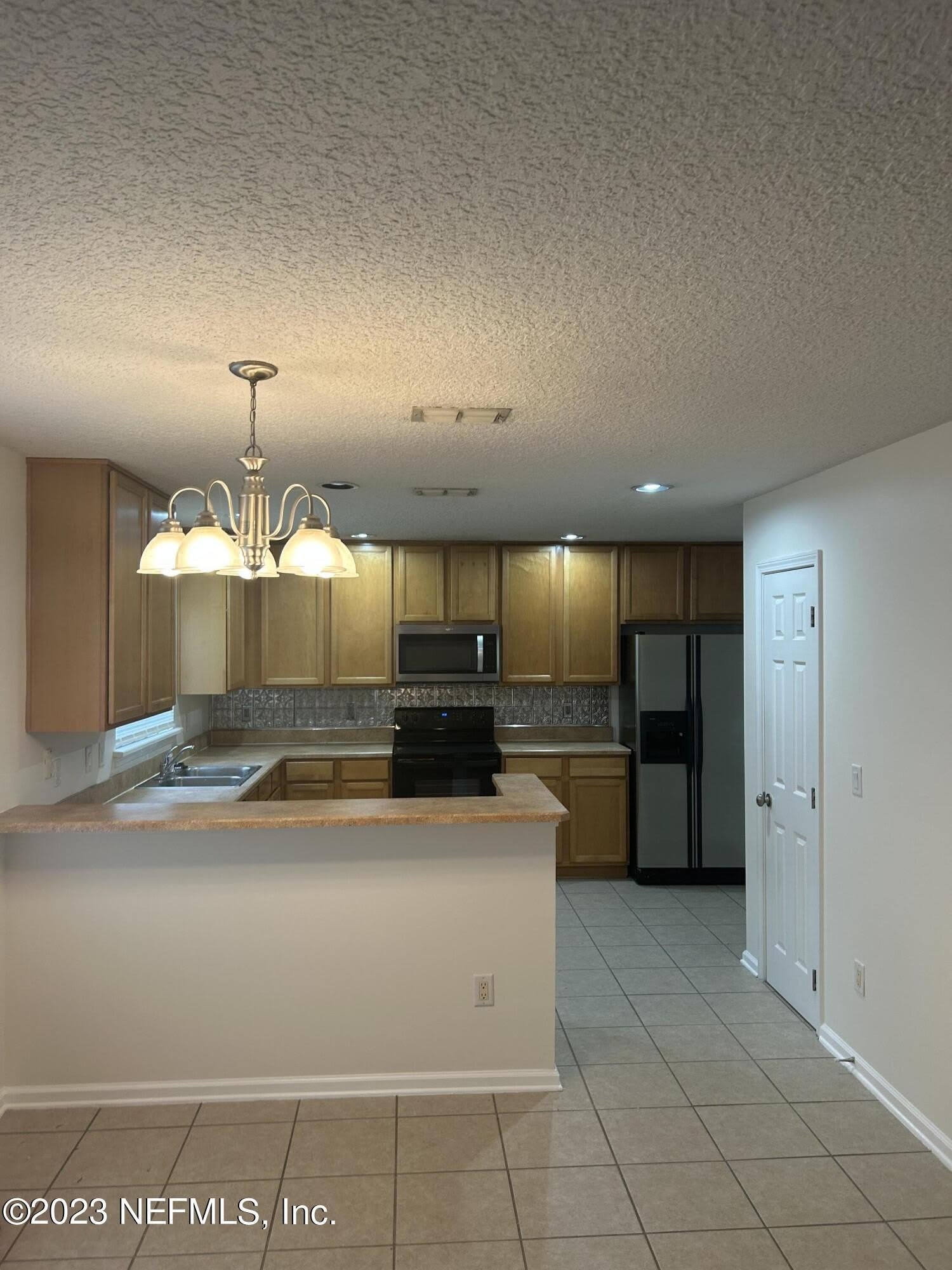 1603 CANOPY OAKS Drive – photo 2