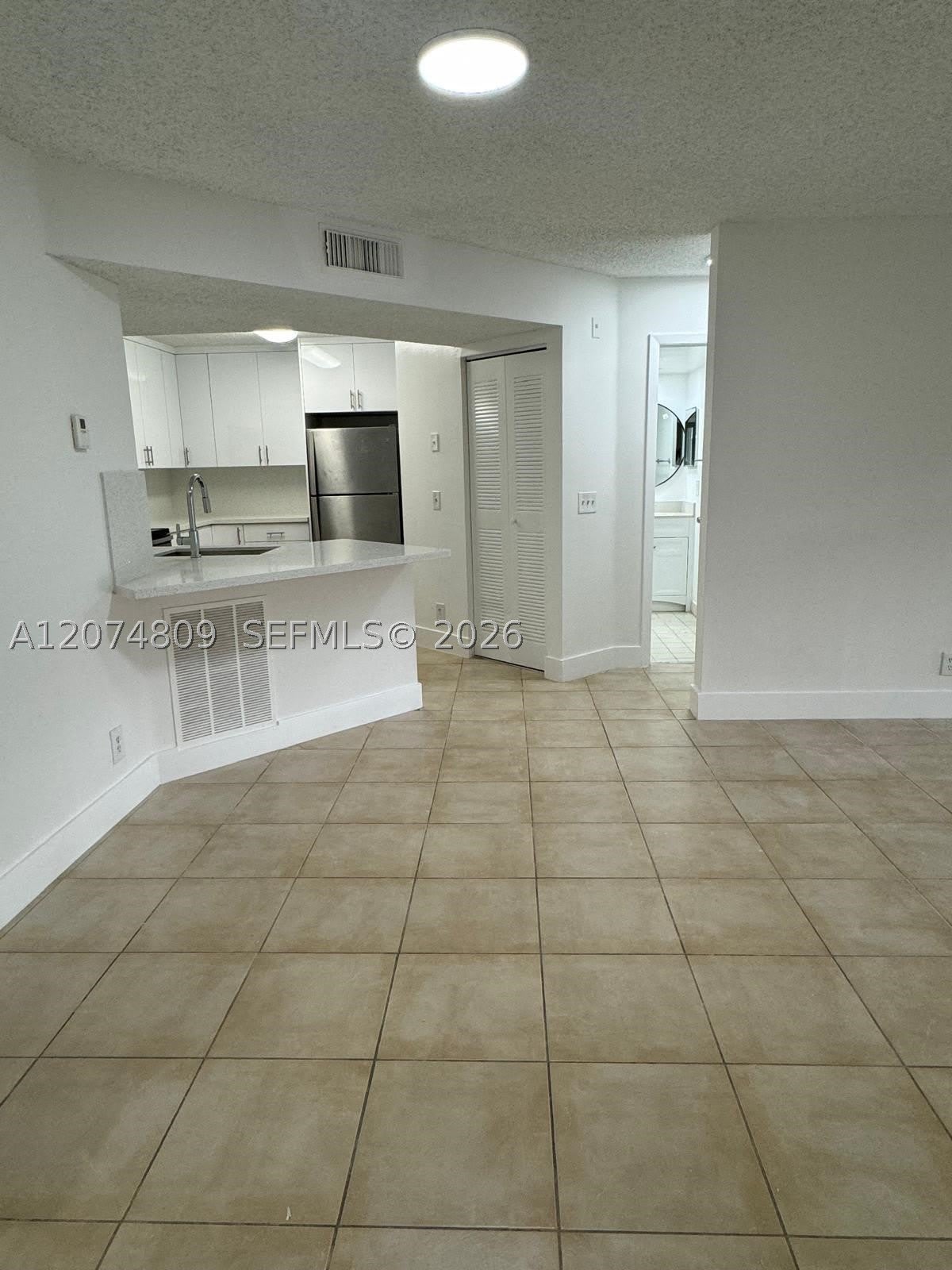 8801 Wiles Rd – photo 3