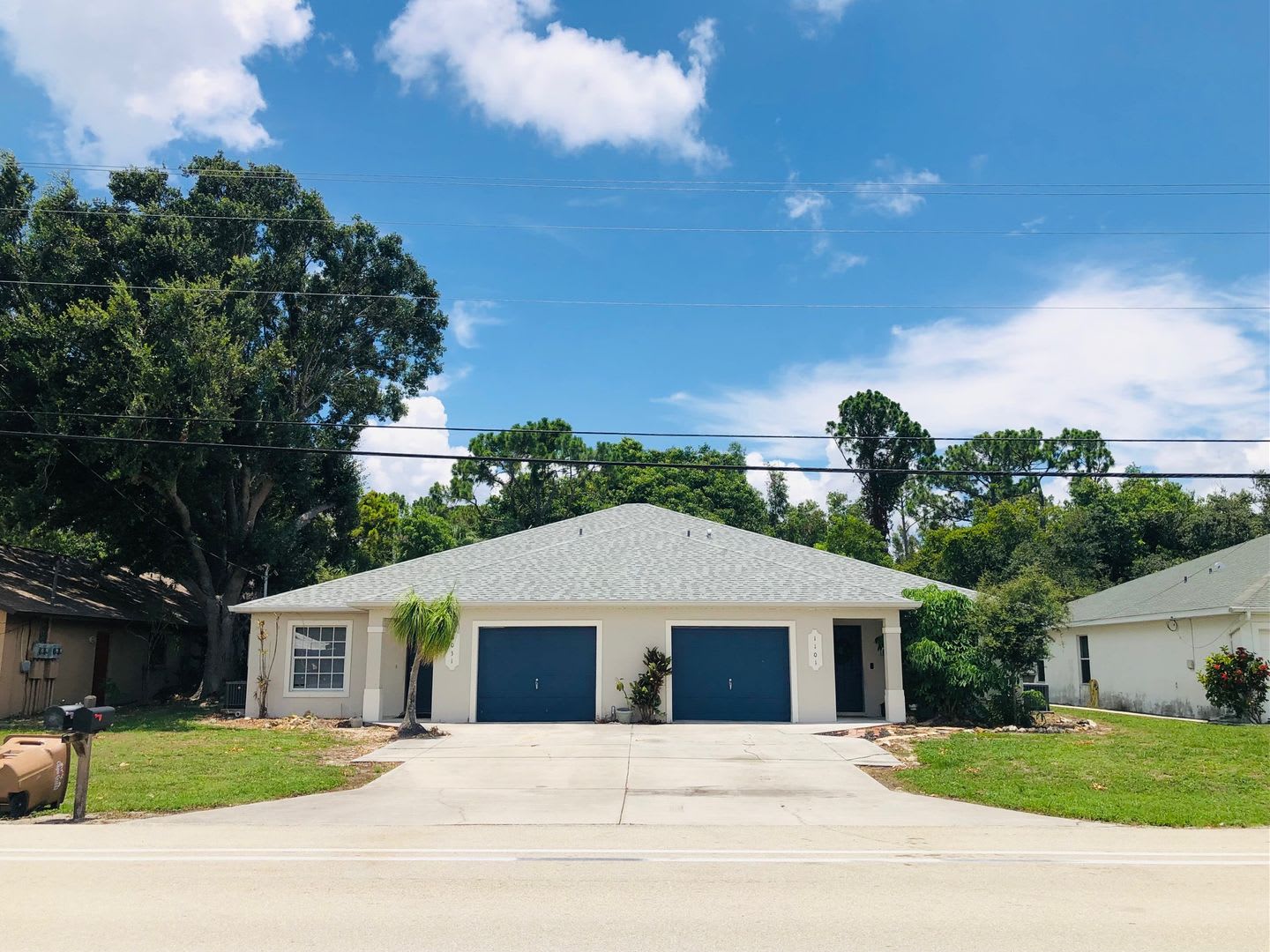 Experience this Cape Coral 3 bedroom 2 bath duplex with 1 car garage and screened in lanai. – photo 1