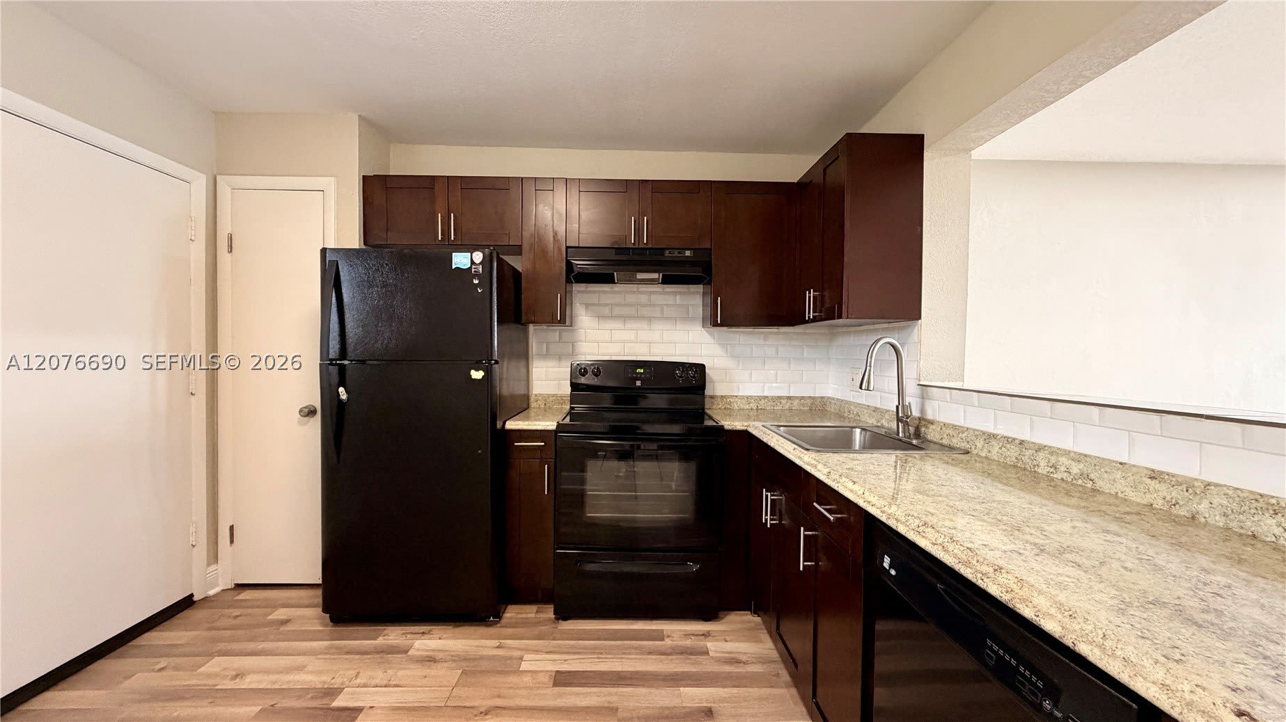 879 NE 195th St – photo 3