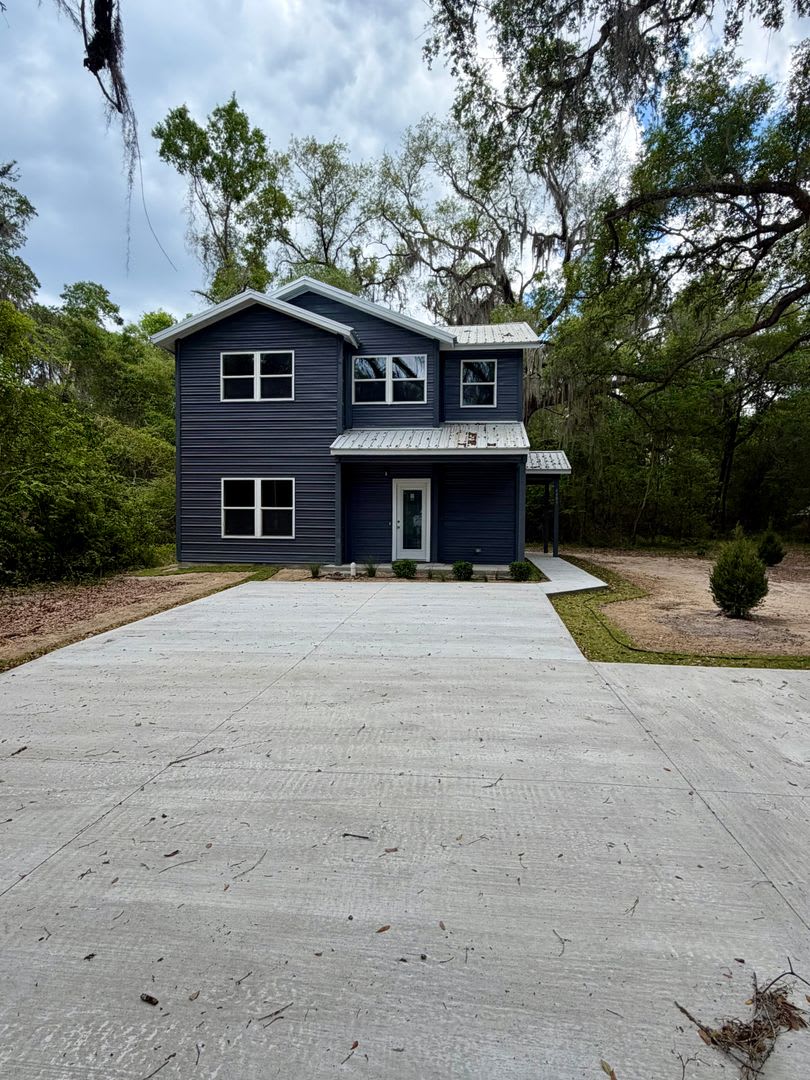 BRAND NEW 4BR / 4.5BA Home in Prime NW Gainesville Location – photo 1