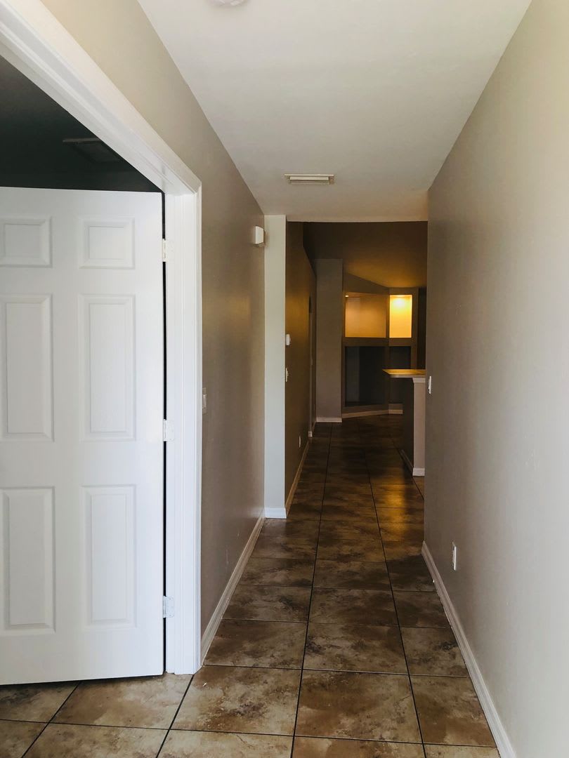 Experience this Cape Coral 3 bedroom 2 bath duplex with 1 car garage and screened in lanai. – photo 3