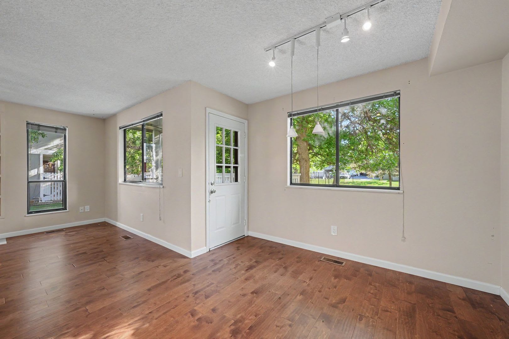 Spacious 2BR/2BA Corner Unit with Finished Basement, Private Patio & Garage – photo 5