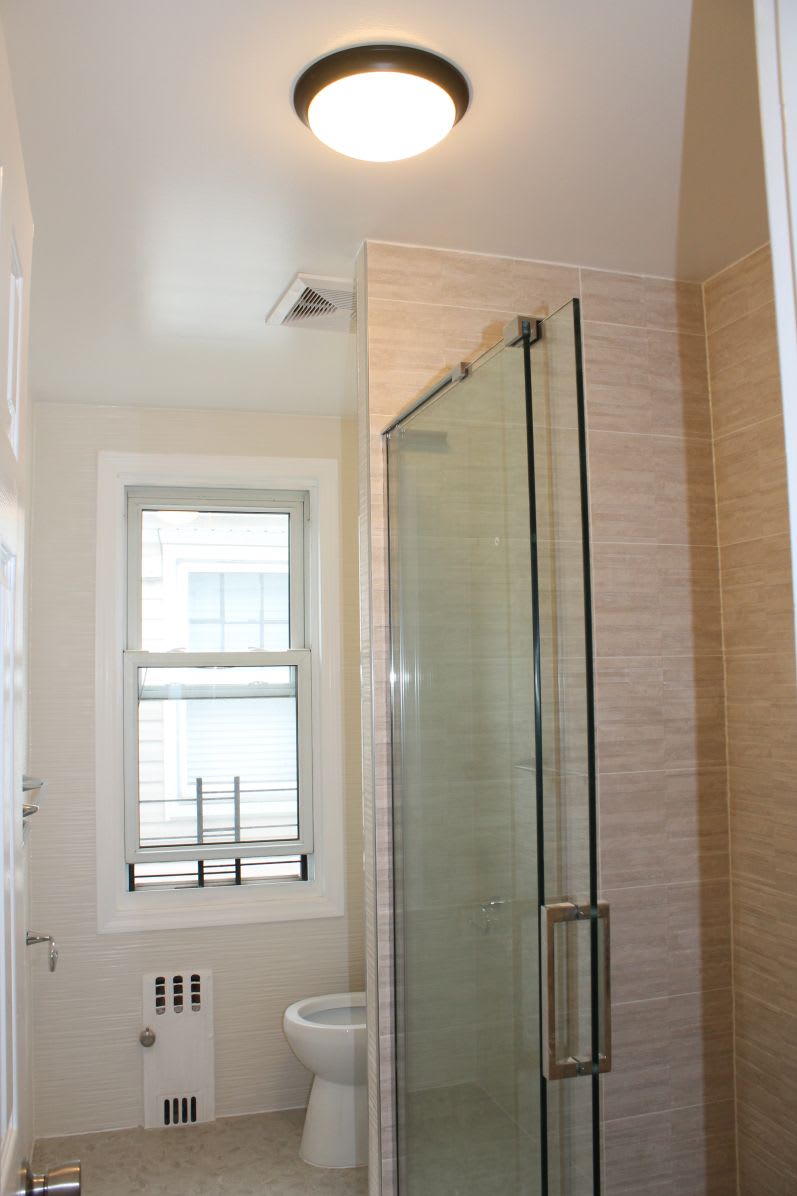 69-54 Loubet St – photo 3