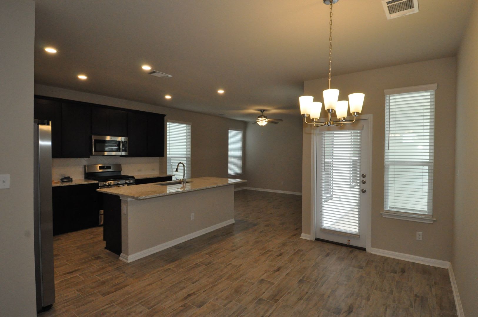 Enjoy a lock and leave lifestyle in this brand new cottage style home at The Retreat at Hero Way – photo 5