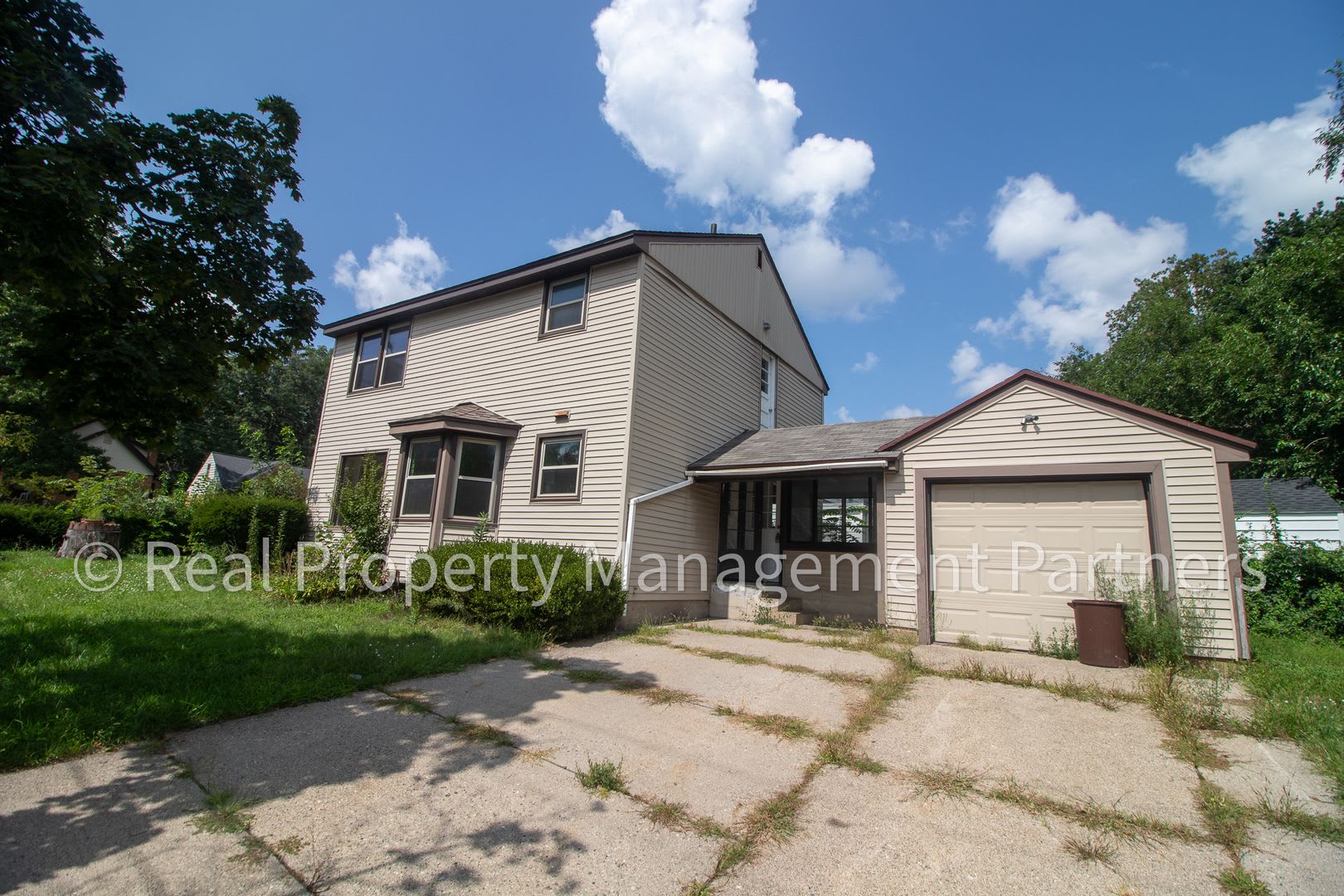 4-Bedroom Home – Renovated Kitchen and 4-Season Sunroom on a Corner Lot – photo 1