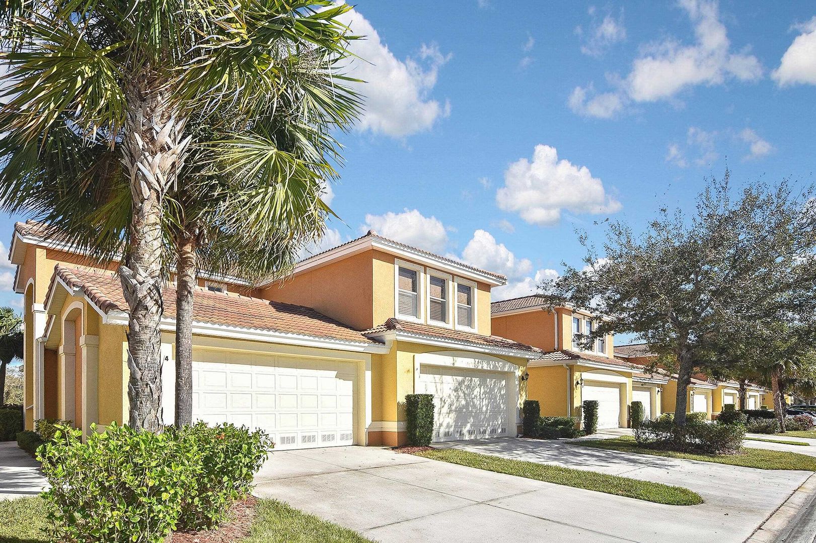 4BR/3BA Fort Myers Coach Home with Lake View & 2-Car Garage — $2,400/mo – photo 1