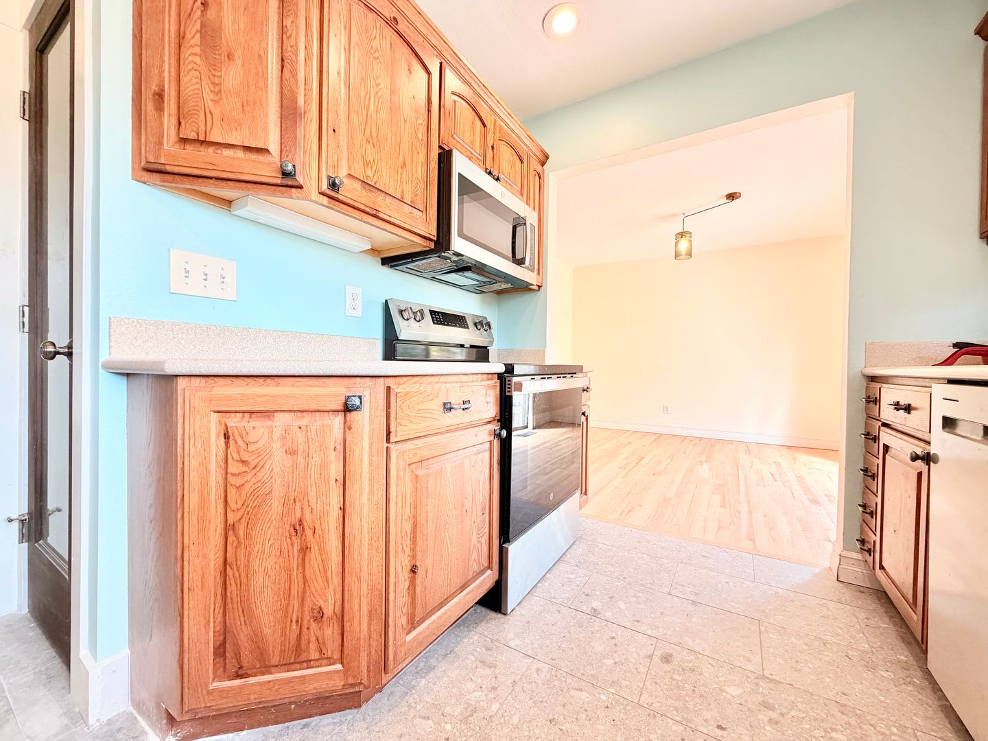 Charming Updated 1950s Home with Refinished Hardwoods & Large Fenced Yard – Landscaping Included! – photo 4