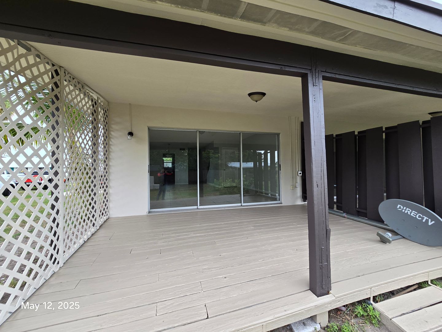 This Renovated Home Provides Modern Convenience With A Durable Metal Roof Impact Resistant Windows And Brand New Carpeting Throughout – photo 2