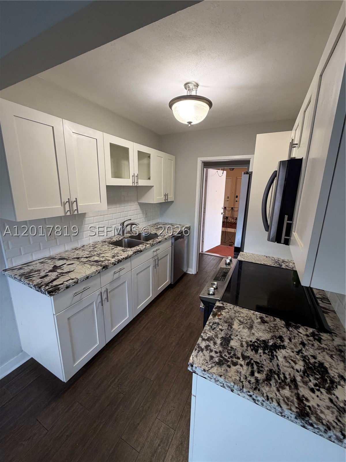 2591 NE 55TH CT – photo 5