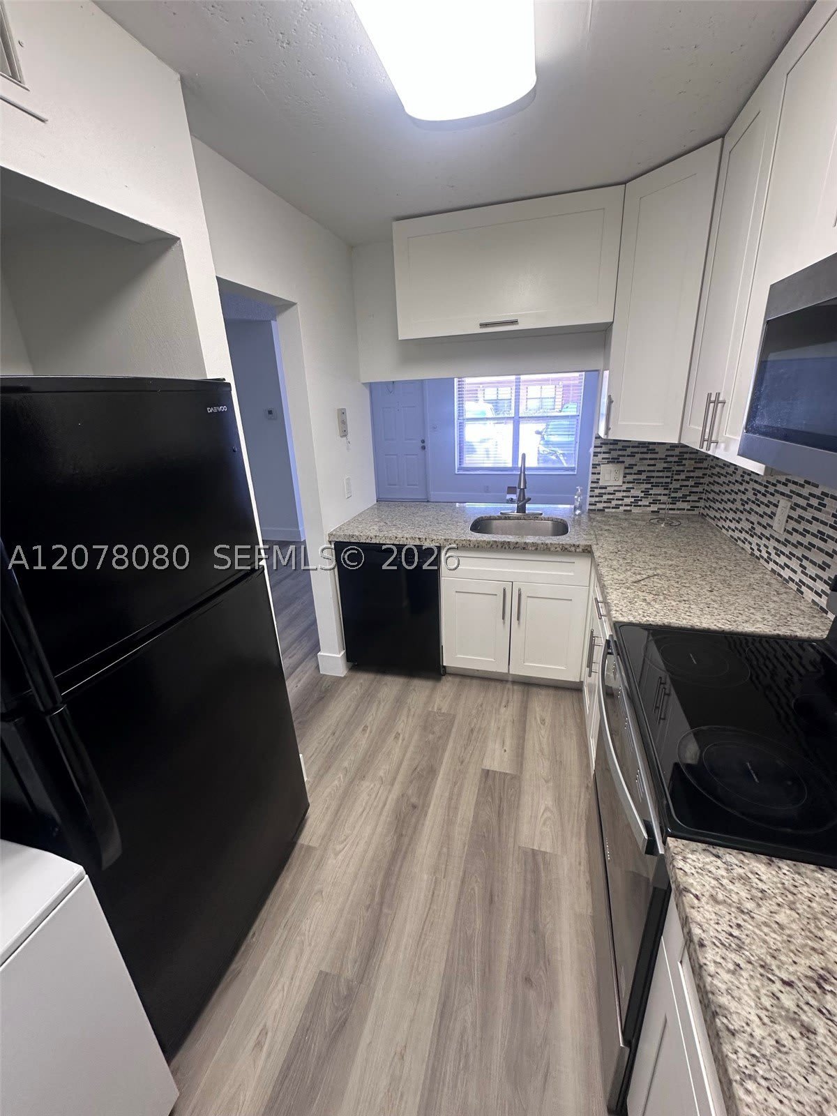 10049 Winding Lake Rd – photo 4