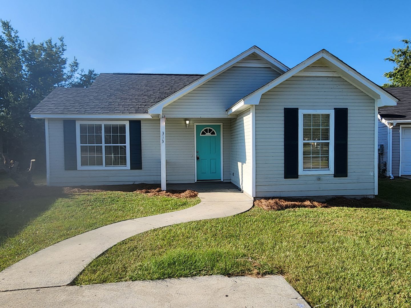 Bright & Inviting 3-Bedroom Home with Open Layout and Fenced Backyard – photo 1