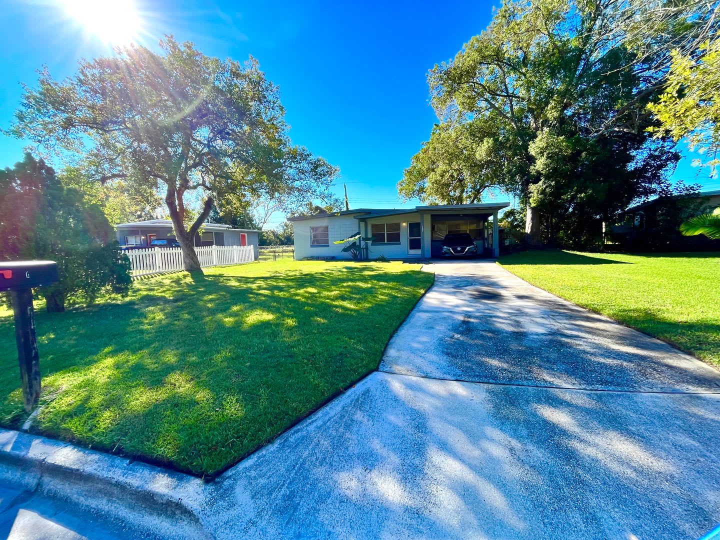 Lawn Service included with this 2BR/1BA w/Carport, Office, and Bonus Room – photo 3