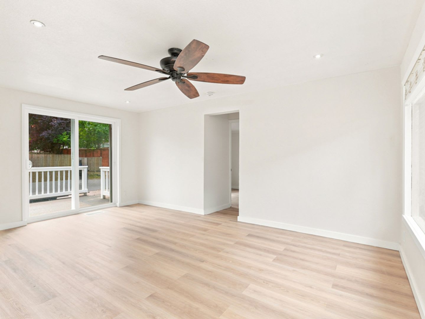 Updated Rambler with covered patio and large detached garage. – photo 4