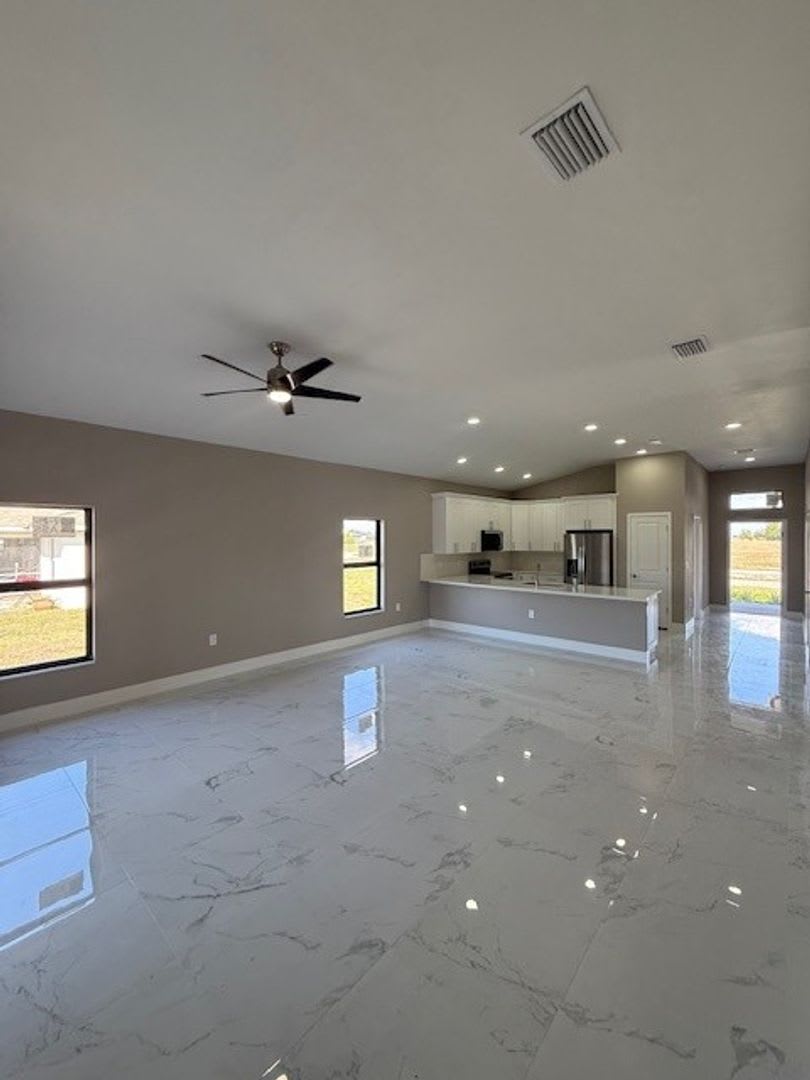 Brand-New Luxury Home with 3-Car Garage & Lawn Care Included – photo 4