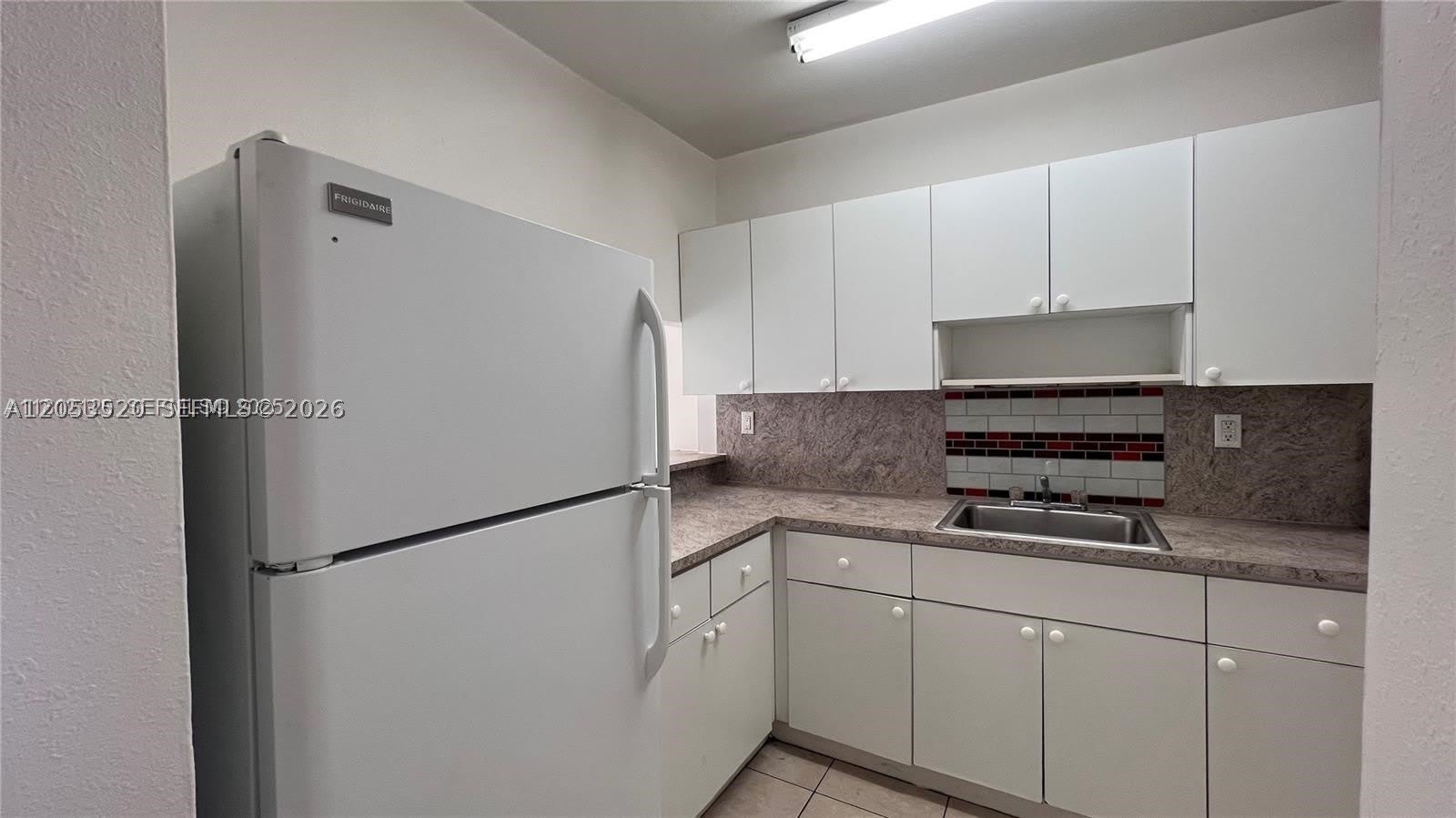 3675 W 11th Ave – photo 4