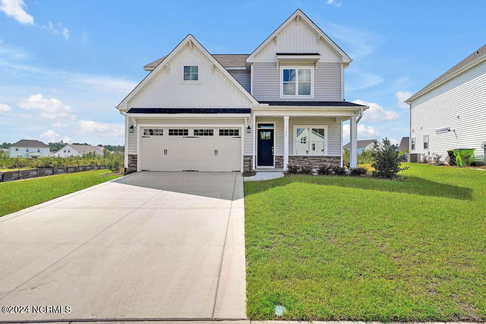 Discover this new spacious 4-bedroom, 3.5-bath home in Grayson Park – photo 1