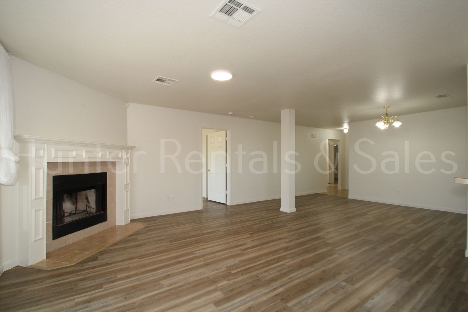Charming 3-Bedroom Home with Fireplace, Spacious Primary Suite & Covered Deck – photo 3